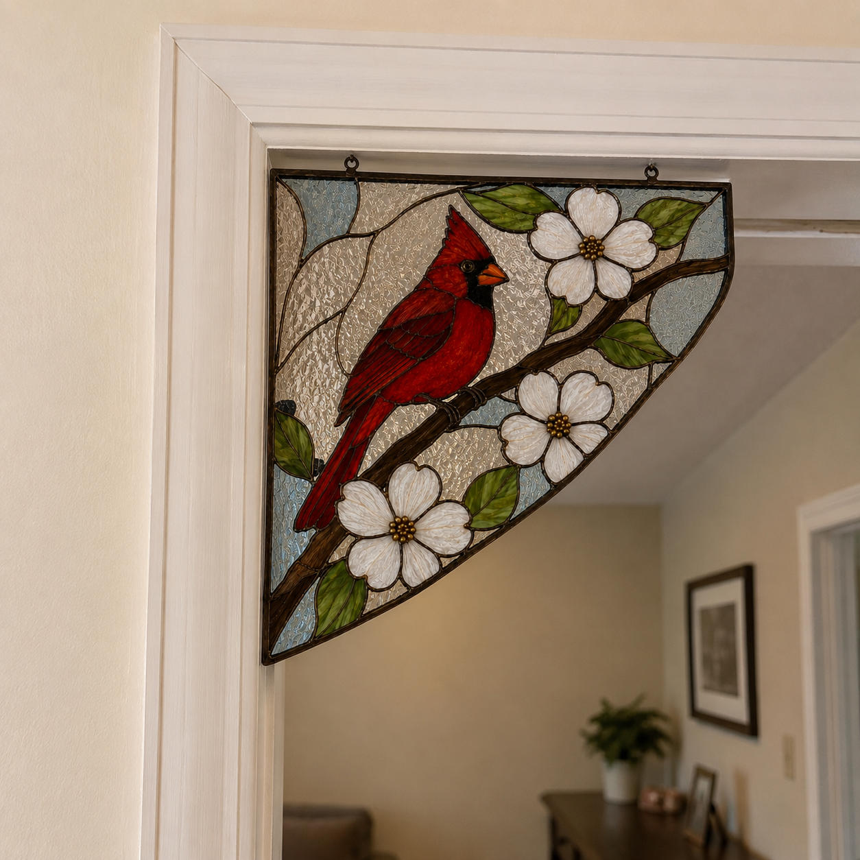 Red cardinal and dogwood stained glass decoration displayed in a doorway corner