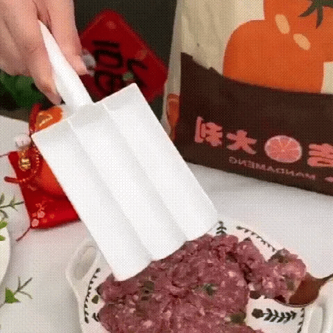 Triple meatball maker releasing portions