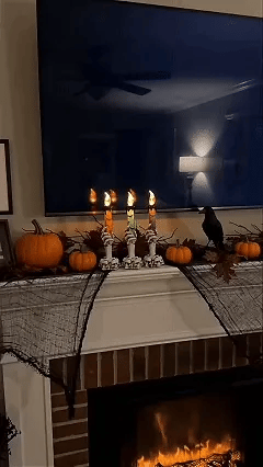 Motion clip showing the skeleton candle on a mantel